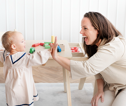 Parent and child playing
